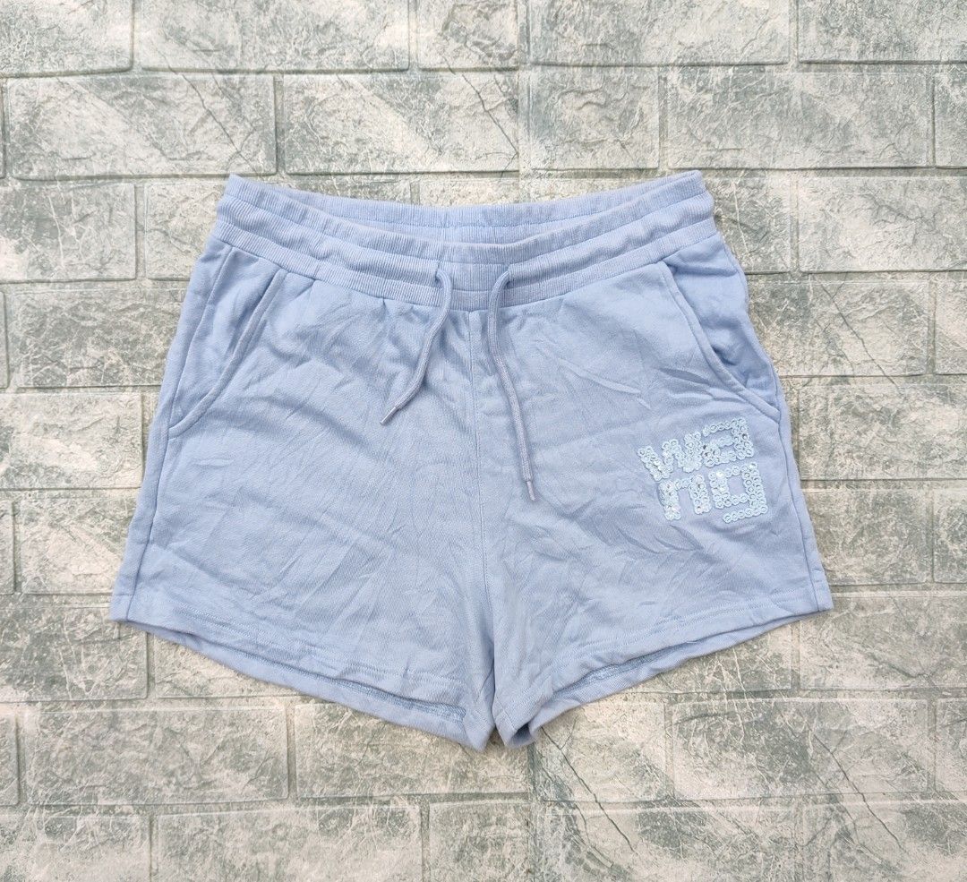 Alexander Wang T Light Blue Sequin Logo Sweat Shorts (Category: Shorts) located in Bayambang. Submitted by mon10192816 (Listing ID 1460681086, Image 1). Description: - Waist 29-33 - Length 13.5 - Issue small stain on back check last photo - Alexander Wang T. light blue sweat shorts - Features brand logo with sequin details on the side - Elastic waistband with drawstring - Made in Portugal - 100% Cotton.