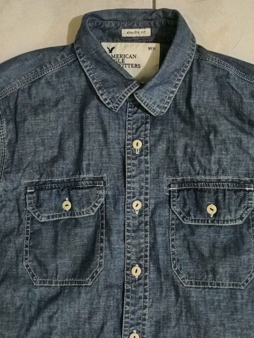 '10s American Eagle outfitters chambrey shirt (Category: Coats, Jackets and Outerwear) located in Manila. Submitted by nostalgic.curated (Listing ID 1460531386, Image 2). Description: MOP : Gcash 🛵 : J&T, Lalamove & can do meet-ups sa malalapit 📍Muntinlupa City.