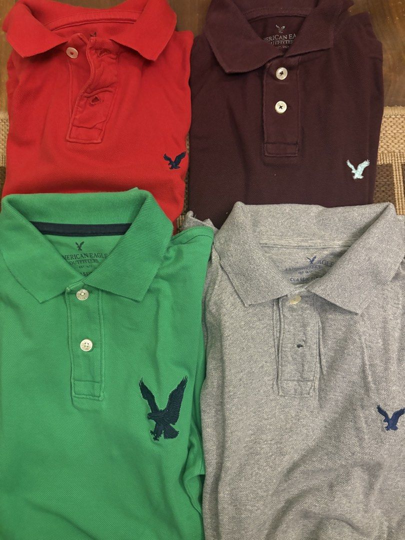 All 4 - American Eagle Outfitters Polo Shirts Bundle (4 Colors) (Category: Tshirts & Polo Shirts ) located in Paranaque City. Submitted by max_bully014 (Listing ID 1460625109, Image 1). Description: - Bundle of 4 American Eagle Outfitters polo shirts - Colors included: Red, Burgundy, Green, Grey - Features classic embroidered eagle logo on chest - Button-up placket at collar - Ideal for casual wear or layering - Sold as a set.