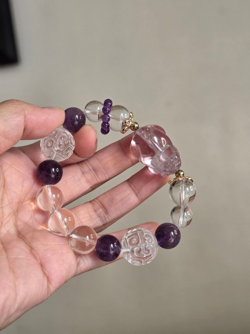 Amethyst pixui bracelet (Category: Bracelets) located in Manila. Submitted by cavalierdolls (Listing ID 1460544817, Image 1). Description: Diy amethyst pixui, clear quartz and amethyst beads and lucky turn..