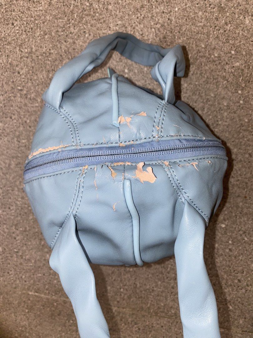 Anello Light Blue Leather BALL Round Bag (Category: Cross-body Bags) located in Pasay City. Submitted by violetttttttttttttt (Listing ID 1460578046, Image 3). Description: - Cute light blue Anello bag - Made of genuine leather - Round shape with zipper closure - Features two comfortable handles - Plenty of life left for everyday use.
