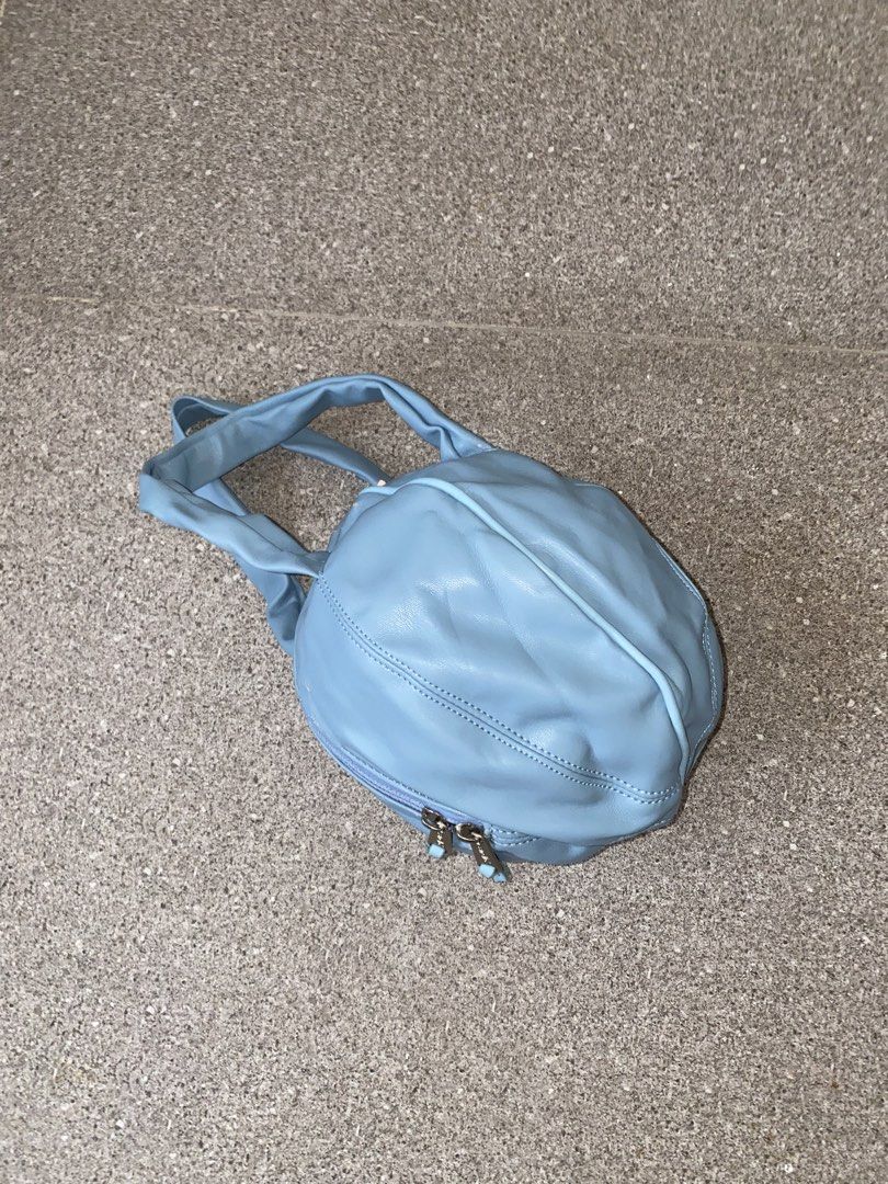 Anello Light Blue Leather BALL Round Bag (Category: Cross-body Bags) located in Pasay City. Submitted by violetttttttttttttt (Listing ID 1460578046, Image 2). Description: - Cute light blue Anello bag - Made of genuine leather - Round shape with zipper closure - Features two comfortable handles - Plenty of life left for everyday use.