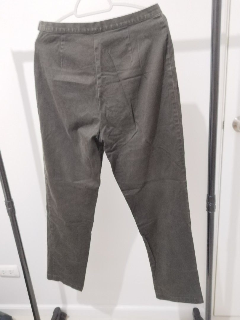 Ann Taylor Stretch Pants Size 8 Dark Grey (Category: Other Bottoms) located in Manila. Submitted by nezzzra (Listing ID 1460698983, Image 2). Description: - Dark grey Ann Taylor pants - Size 8 on tag but fits like size 4 - Material: Cotton with spandex for stretch - Closure: Side zipper - Style: Straight leg - Versatile: Great for work or casual outfits.