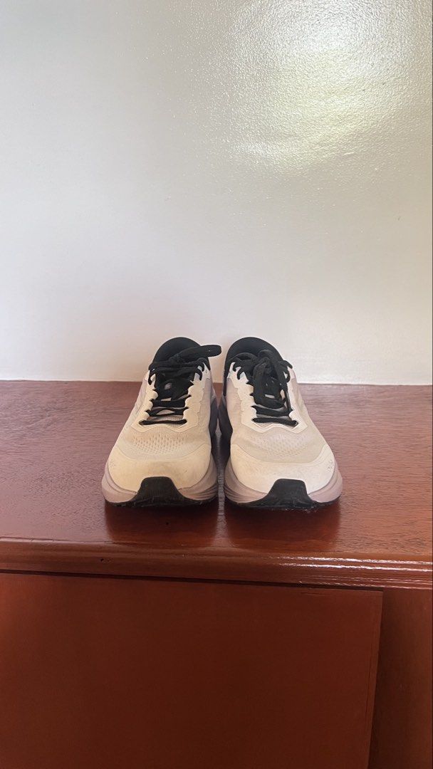 ANTA PG7 White Running Shoes (Category: Sneakers) located in Dasmarinas. Submitted by irishcampano1 (Listing ID 1460568049, Image 3). Description: - Brand: ANTA - Color: White with black laces and interior - Accents: Light grey and pink on the sole - Size: US 10 / UK 9 / EUR 44 - Features: Comfortable, lightweight - Ideal for: Running, everyday wear.