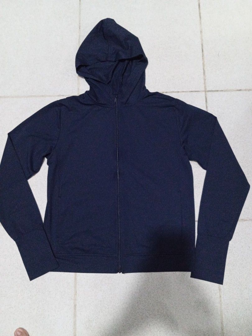 UV Protection Hoodie (Category: Coats, Jackets and Outerwear) located in Pasig City. Submitted by lu_agui24 (Listing ID 1460595362, Image 1). Description: Navy Blue Anti UV Jacket with hood and 2 sides pocket.