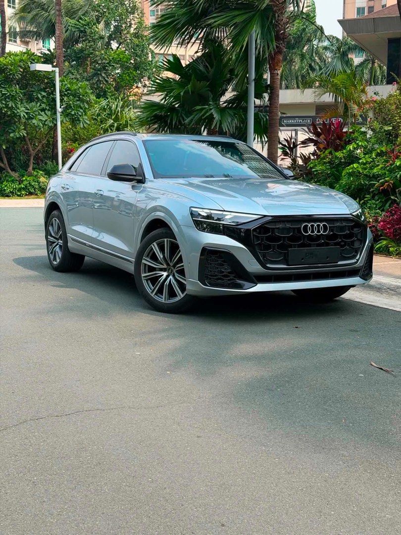 Audi Q8 Quattro (Hybrid) Auto (Category: Used Cars) located in Manila. Submitted by quality_cars (Listing ID 1460623915, Image 2). Description: 2026 acq Audi Q8 Quattro (Hybrid) Price: 5.498m (Negotiable) Aka “Baby Lamborghini Urus” No coding since hybrid Local PGA cars (green plates) Brandnew condition 1k mileage only 3.0L V6 turbo, Hybrid, Quattro AWD Almost 400hp Ceramic coated Panoramic sunroof Power curtains Brown leather seats with massage 