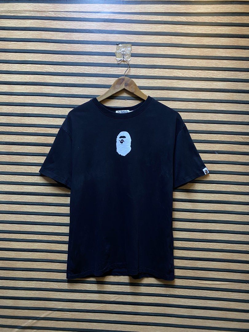 Authentic A Bathing Ape (BAPE) Ape Head T (Category: Tshirts & Polo Shirts ) located in Makati City. Submitted by drip.poww (Listing ID 1460532692, Image 1). Description: - Authentic Bape - Color: Black - Size: Large - Dimes: 22x28 - Authentic - Excellent condition - Need wash, fresh from bale - Material: 100% Cotton Please don’t expect too much—these are thrifted (ukay) items. 😊 !!STILL NEGOTIABLE!!.