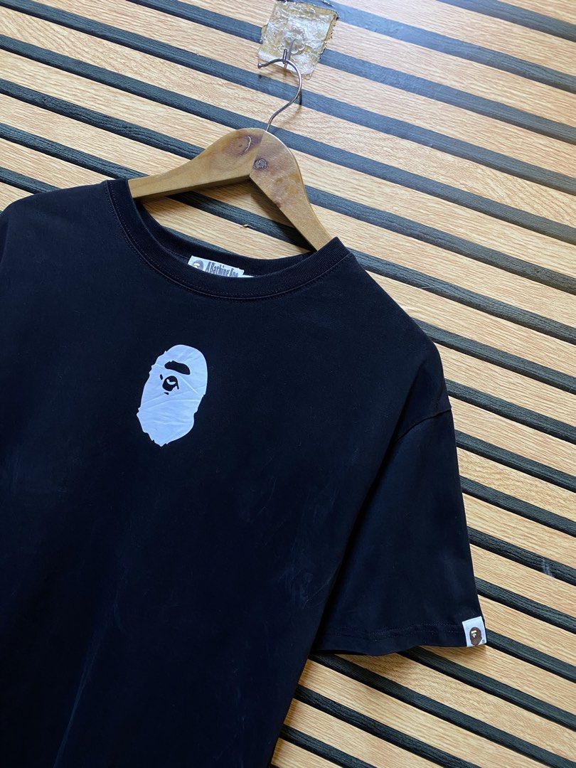 Authentic A Bathing Ape (BAPE) Ape Head T (Category: Tshirts & Polo Shirts ) located in Makati City. Submitted by drip.poww (Listing ID 1460532692, Image 3). Description: - Authentic Bape - Color: Black - Size: Large - Dimes: 22x28 - Authentic - Excellent condition - Need wash, fresh from bale - Material: 100% Cotton Please don’t expect too much—these are thrifted (ukay) items. 😊 !!STILL NEGOTIABLE!!.
