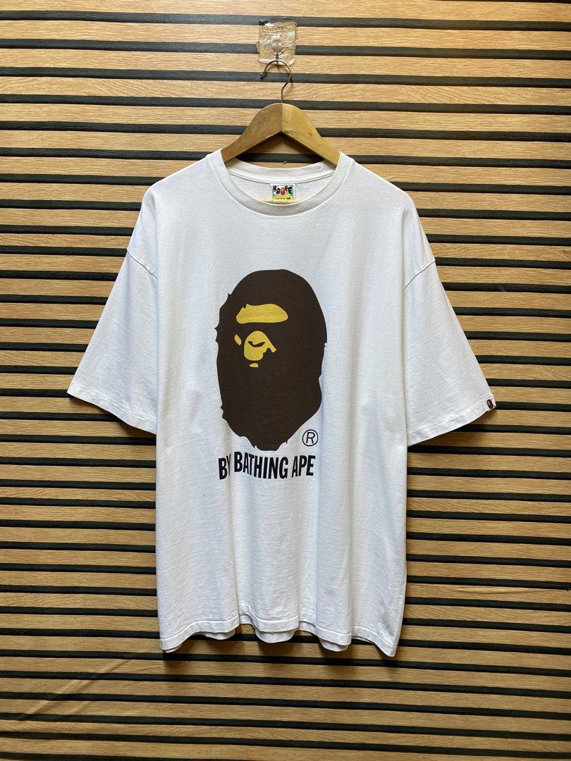 AUTHENTIC BAPE “BIG HEAD” (Category: Tshirts & Polo Shirts ) located in Makati City. Submitted by drip.poww (Listing ID 1460544759, Image 1). Description: - Authentic Bape - Color: White - Size: XXXL - Dimes: 25.5x32 - Authentic - Excellent condition - Need wash, fresh from bale - Material: 100% Cotton Please don’t expect too much—these are thrifted (ukay) items. 😊 !!STILL NEGOTIABLE!!.