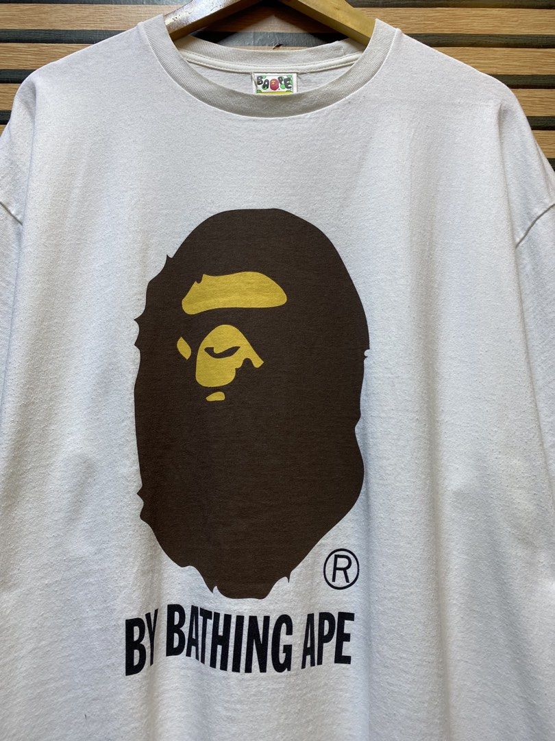 AUTHENTIC BAPE “BIG HEAD” (Category: Tshirts & Polo Shirts ) located in Makati City. Submitted by drip.poww (Listing ID 1460544759, Image 3). Description: - Authentic Bape - Color: White - Size: XXXL - Dimes: 25.5x32 - Authentic - Excellent condition - Need wash, fresh from bale - Material: 100% Cotton Please don’t expect too much—these are thrifted (ukay) items. 😊 !!STILL NEGOTIABLE!!.