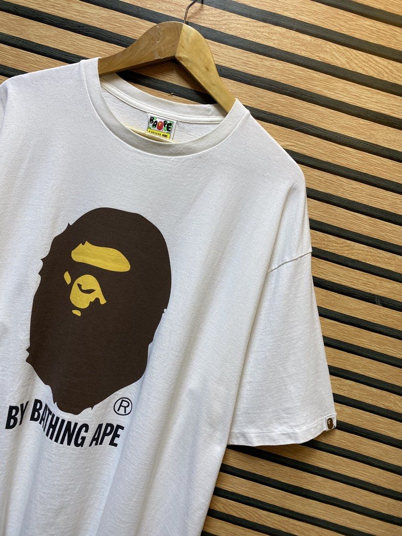 AUTHENTIC BAPE “BIG HEAD” (Category: Tshirts & Polo Shirts ) located in Makati City. Submitted by drip.poww (Listing ID 1460544759, Image 2). Description: - Authentic Bape - Color: White - Size: XXXL - Dimes: 25.5x32 - Authentic - Excellent condition - Need wash, fresh from bale - Material: 100% Cotton Please don’t expect too much—these are thrifted (ukay) items. 😊 !!STILL NEGOTIABLE!!.