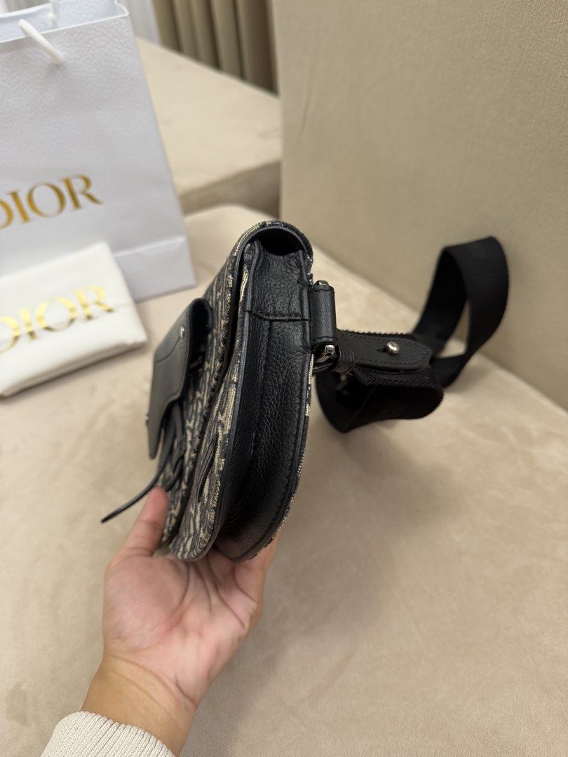 Authentic Christian Dior Saddle Messenger Bag (Category: Luxury Bags & Wallets) located in Manila. Submitted by maria_2326 (Listing ID 1459515956, Image 2). Description: Christian Dior Saddle Messenger Bag Guarantee Authentic With dust bag and paper bag only No lowballing! Location: Manila/QC.