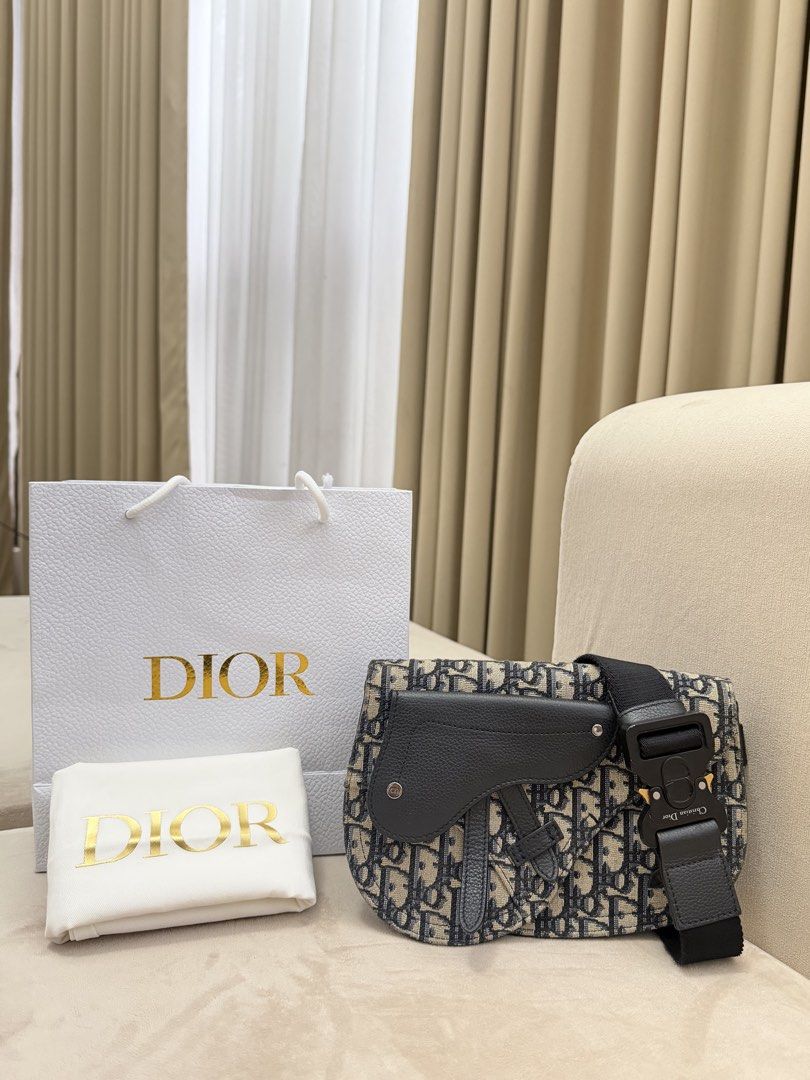Authentic Christian Dior Saddle Messenger Bag (Category: Luxury Bags & Wallets) located in Manila. Submitted by maria_2326 (Listing ID 1459515956, Image 1). Description: Christian Dior Saddle Messenger Bag Guarantee Authentic With dust bag and paper bag only No lowballing! Location: Manila/QC.