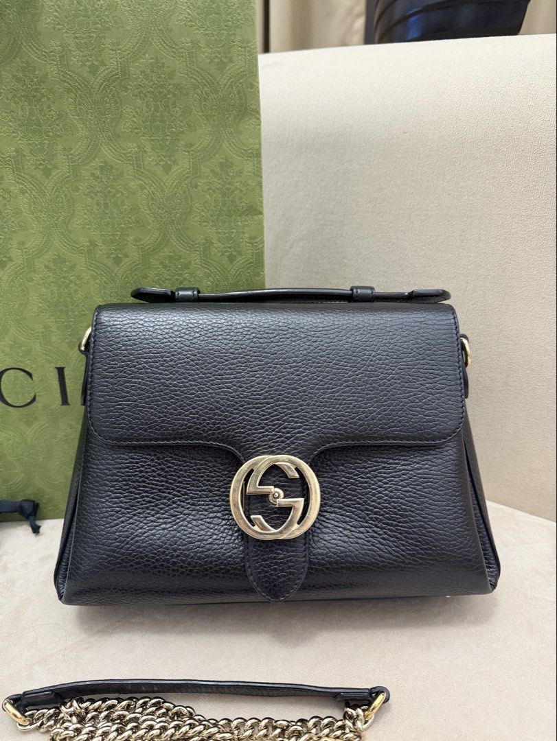 Authentic Gucci Interlocking Top Handle (Category: Luxury Bags & Wallets) located in Manila. Submitted by maria_2326 (Listing ID 1460545121, Image 2). Description: Gucci Interlocking Top Handle Black Guarantee Authentic Complete Inclusions Paper bag, box, dust bag, booklet and chain sling No lowballing! Location: Manila/QC.