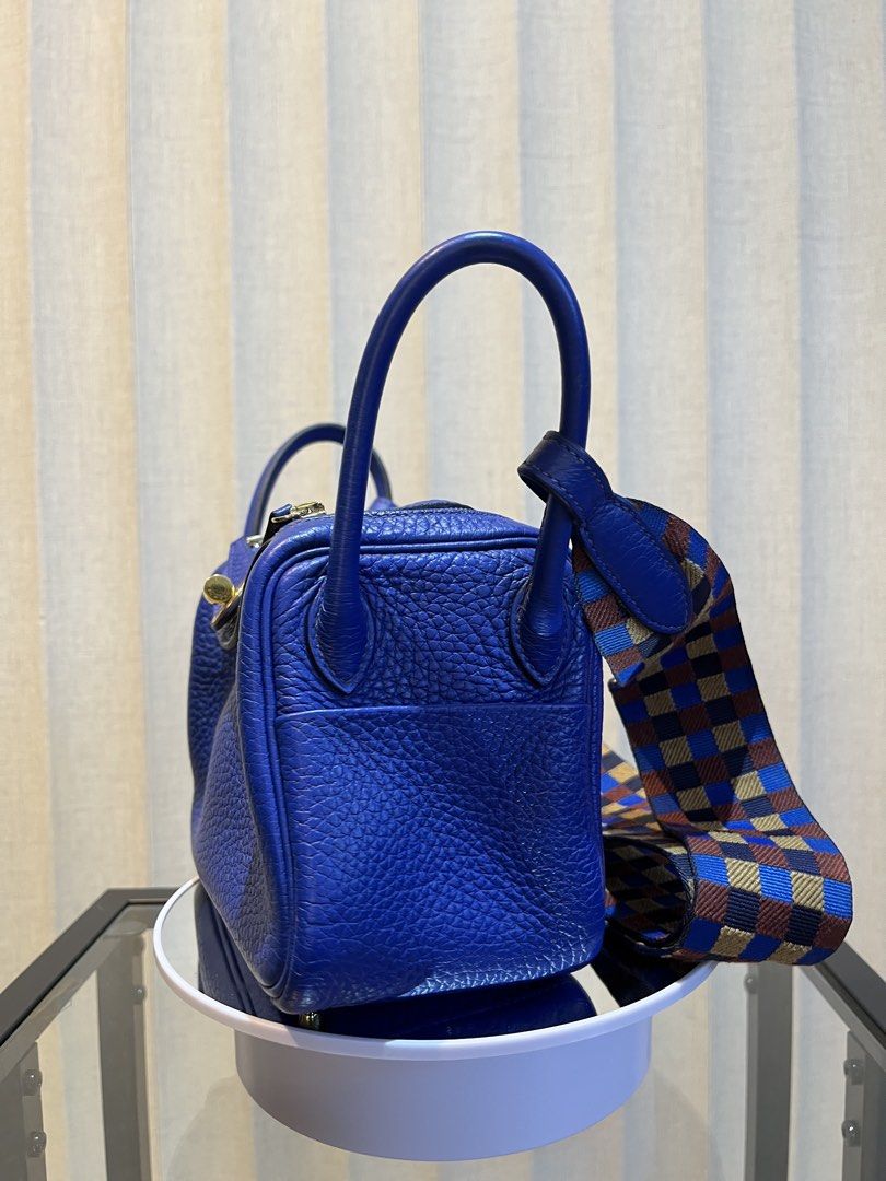 Authentic Hermès Lindy Blue w/ Box + Entrupy Certificate | Preloved (Category: Luxury Bags & Wallets) located in Quezon City. Submitted by racqi08 (Listing ID 1460602231, Image 3). Description: HERMÈS LINDY | AUTHENTIC 💙 Selling my preloved authentic Hermès Lindy in a beautiful royal blue with gold-tone hardware and multicolor woven strap. A timeless Hermès piece with a relaxed, effortless shape. Used but well cared for and still in beautiful co