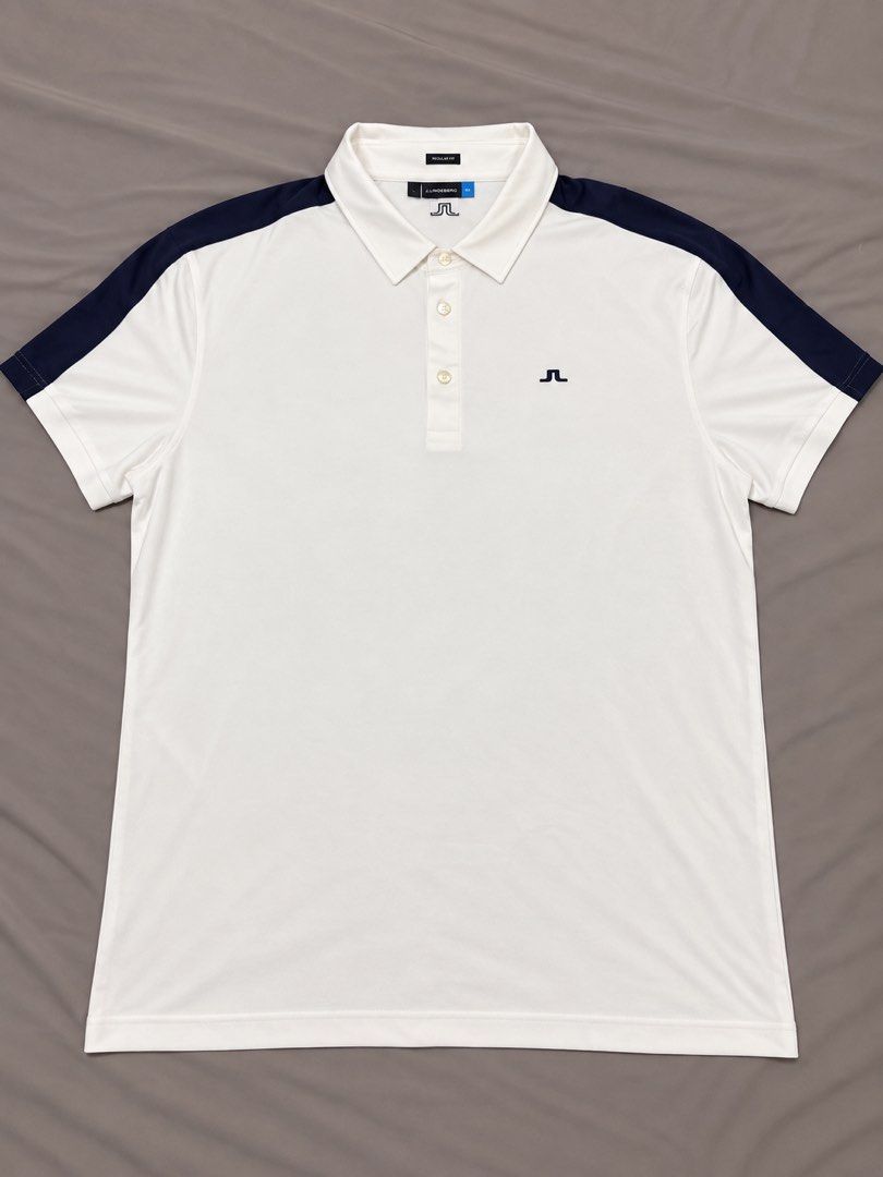 AUTHENTIC j.lindeberg White Polo – Navy Colorblock (Category: Tshirts & Polo Shirts ) located in Pasig City. Submitted by jjjj0987 (Listing ID 1460564439, Image 1). Description: • Color: White / Navy • Navy shoulder & sleeve detailing • Signature JL chest and back logo • Regular fit • May need washing as this was stored • Actual item shown in photos 📸 More photos available upon request. 🚚 Delivery fee shouldered by buyer..