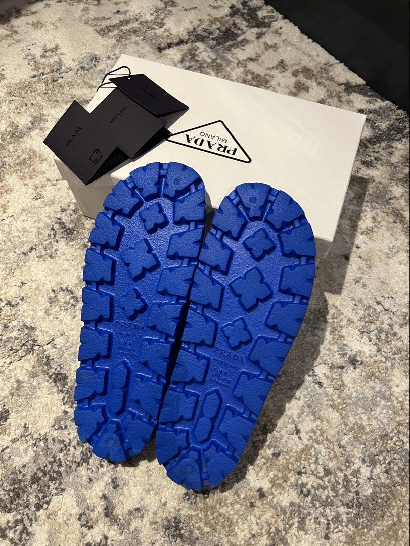 AUTHENTIC PRADA SOF SLIDE IN COLOR AZZURRO | 40 (Category: Sneakers & Footwear) located in Cavite. Submitted by charmscloset888 (Listing ID 1460560982, Image 2). Description: My Personal preowned Used once indoors Comes with Box and Product Cards Size 40 Insole 10".
