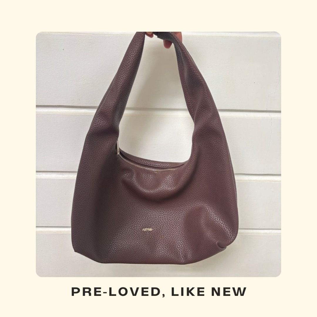 AZTRID Small Hobo Bag - Brown (Category: Shoulder Bags) located in Guiguinto. Submitted by mariejenna05 (Listing ID 1460521472, Image 2). Description: AZTRID Small Hobo Bag - bought last year for PHP 799 - Fine pebbled with silver hardware Preferred MOP: B P I / G Cash Payment first before shipping :) .
