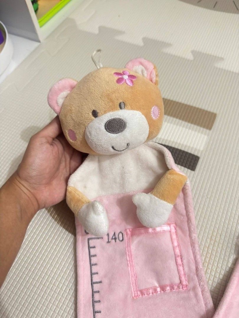 baby growth chart (Category: Nursery Lighting & Decor) located in Quezon City. Submitted by zippy123 (Listing ID 1460570744, Image 2). Description: Teddy Bear Growth Chart 🧸🌸 pang decor sa room, also pang measure sa height ni baby, pwede lagyan ng pictures ni baby. likenew condition retail price almost 2k 😱 🏷️Mine 200 only.