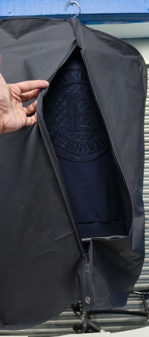 Balmain Paris Limited Edition Navy Bomber Jacket (Category: Coats, Jackets and Outerwear) located in Zamboanga. Submitted by benbryanab14320 (Listing ID 1460657992, Image 3). Description: - Authentic Navy Balmain Paris Bomber Jacket - Premium Leather Sleeves and Details - Iconic Balmain 'B' Logo on Chest - Large Embossed Balmain Logo on Back - "Balmain Paris" Text Branding on Front and Sleeve - Comes with Original Tags and Garment Bag - Size: 46 