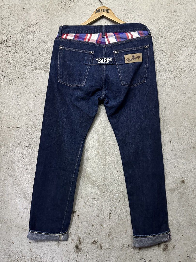 BAPE 2009 Type-06 Slim Jeans Indigo Denim (Category: Jeans) located in Quezon City. Submitted by stre3tw3ar (Listing ID 1460524672, Image 2). Description: - Authentic BAPE Type-06 Jeans - Year: 2009 - Fit: Slim - Wash: Dark Indigo Denim - Special Details: Plaid lining at waistband & pocket trim - Branding: Classic BAPE logo on back pocket - Origin: Made in Japan - Material: Refer to label for details.