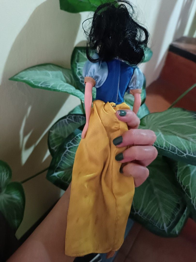 Barbie Snow White (Category: Figurines & Statues) located in Las Pinas. Submitted by mitchmiko16 (Listing ID 1460520839, Image 2). Description: - Classic Snow White doll - Iconic blue and yellow dress - Styled black hair - Ready for a new home - Great for collectors or play.