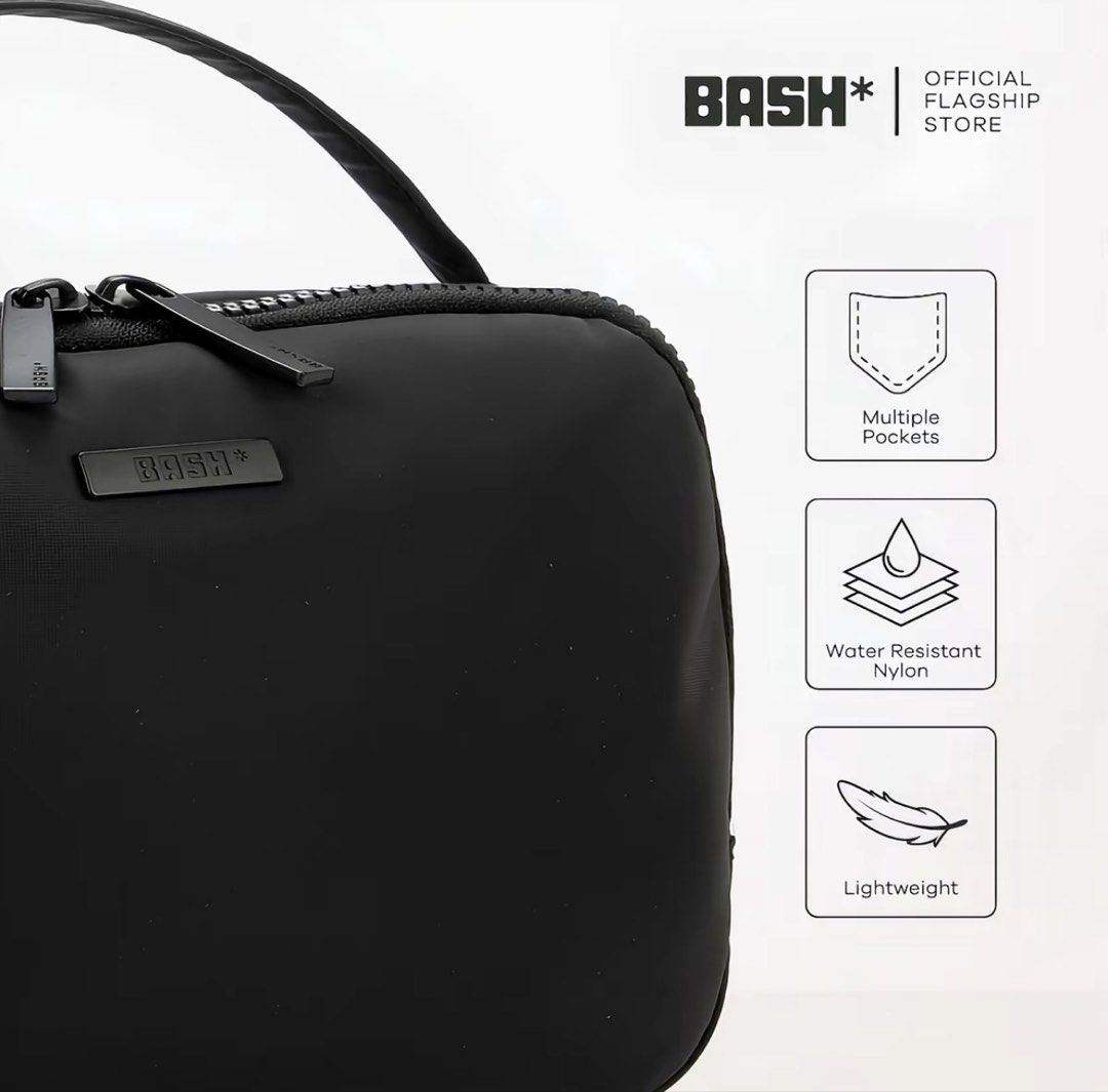 BASH* | ESSENTIALS TECH ORGANIZER (Category: Purses & Pouches) located in Quezon City. Submitted by avenue.de.belle (Listing ID 1460557333, Image 3). Description: BASH* | ESSENTIALS TECH ORGANIZER • Oak • Sakura 23cm (L) × 8cm (W) x 15cm (H) - Solid-toned color with matte-finished logo - Top-handle organizer with zip main compartment closure - Matte finish hardware - Semi-structured construction - With two intertior gartered mesh pockets - With v