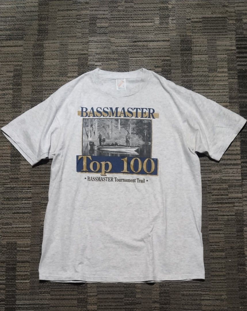 Bass Master vintage tee (Category: Activewear) located in Mandaue City. Submitted by nuke-archive (Listing ID 1460583006, Image 1). Description: Vintage 90s Bassmaster Top 100 Tournament Trail Tee (Jerzees Tag) Price: ₱550 (+Sf) payment:Gcash Description: Tag: Authentic 90s Jerzees Activewear (Size L) W21xL27 Condition: Excellent vintage condition. Graphic print is crisp with no major cracking, stains, or holes. Beautiful heather grey blank. Aest