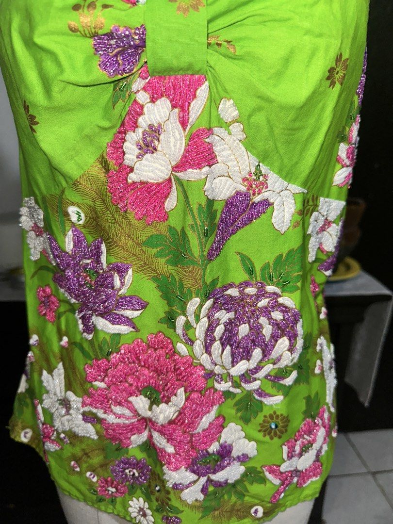 Beaded Green Floral Halter Top (Category: Sleeveless) located in Quezon City. Submitted by marshyco (Listing ID 1460639960, Image 3). Description: - Vibrant bright green halter top - Eye-catching floral print - Flattering smocked waist - Cute bow detail at the neckline .