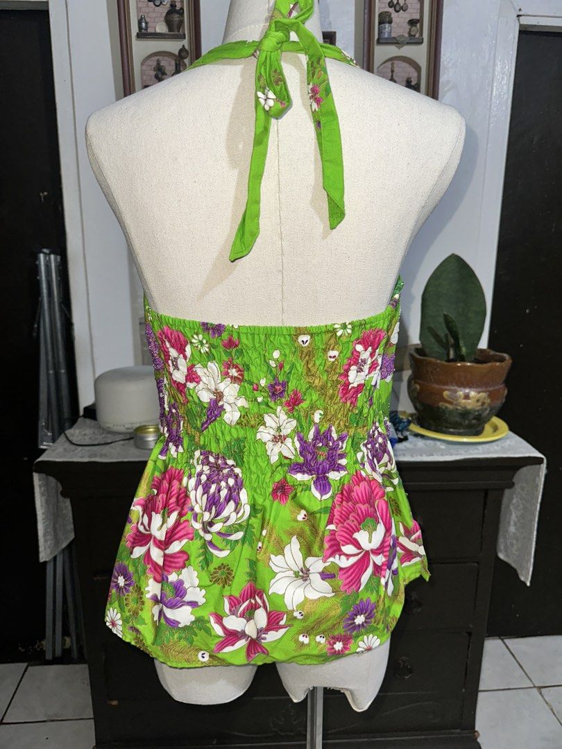 Beaded Green Floral Halter Top (Category: Sleeveless) located in Quezon City. Submitted by marshyco (Listing ID 1460639960, Image 2). Description: - Vibrant bright green halter top - Eye-catching floral print - Flattering smocked waist - Cute bow detail at the neckline .