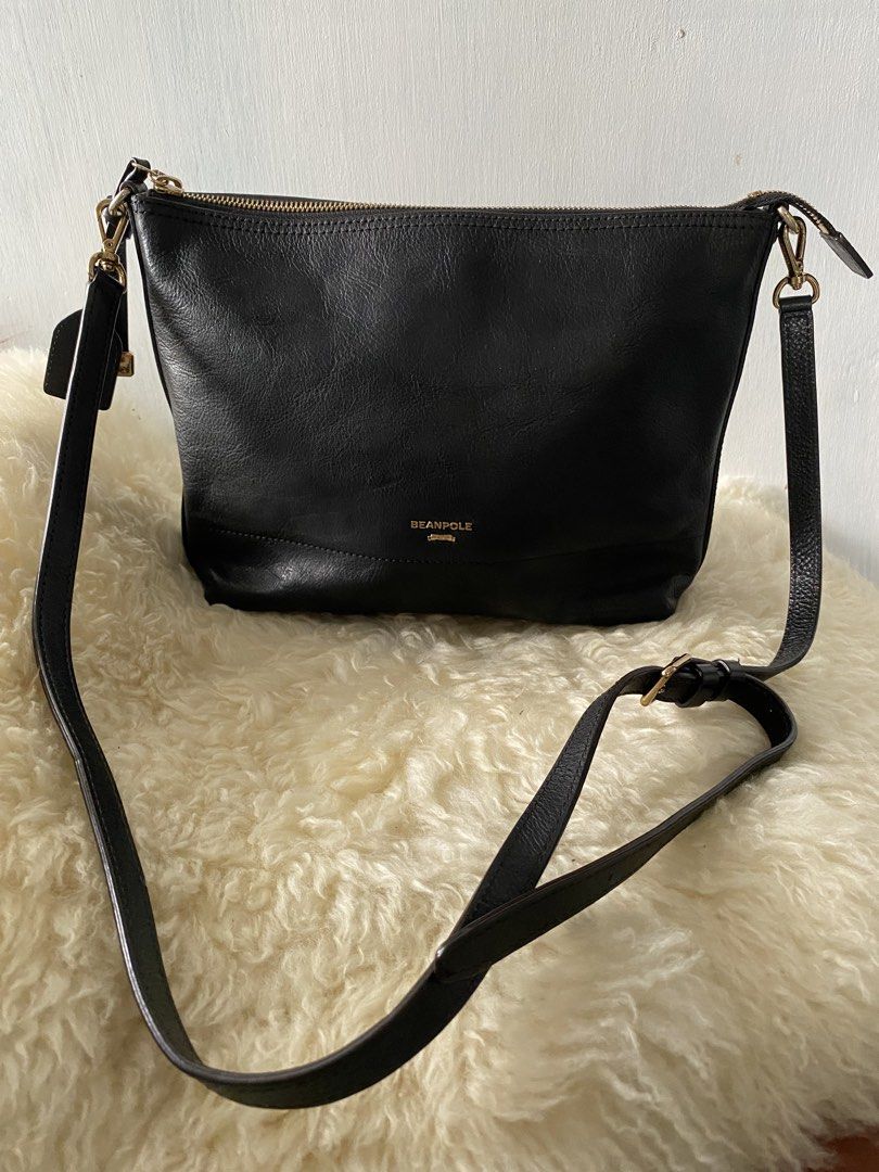 Beanpole Black Leather Crossbody Bag (Category: Cross-body Bags) located in Taguig. Submitted by sandzclick (Listing ID 1460673945, Image 1). Description: - Brand: Beanpole - Material: Black Leather - Closure: Gold Zipper - Interior: Card slots - Strap: Adjustable crossbody strap - Design: Simple and classic - Ideal for: Everyday use.