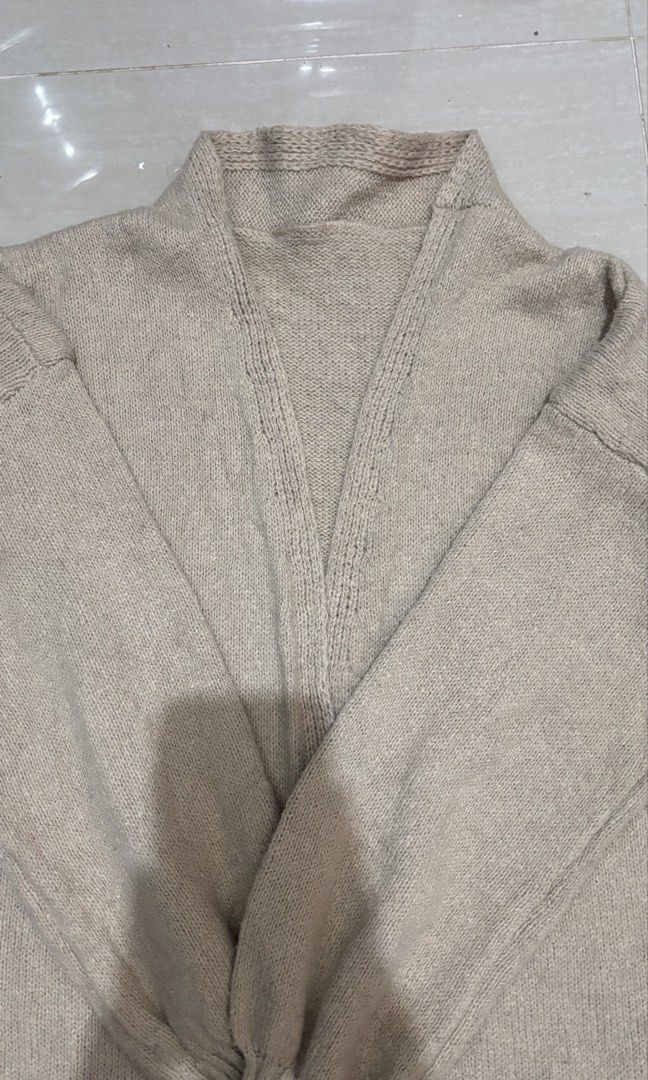 Beige Knit Cardigan (Category: Coats, Jackets and Outerwear) located in San Carlos. Submitted by decluttergirly.bear (Listing ID 1459169428, Image 2). Description: no brand good condition color may vary depending on lighting manage your expectations because this is preloved not bnew :) mop: gcash (payfirst) mod: jnt (buyer shoulder sf) loc: Pangasinan .