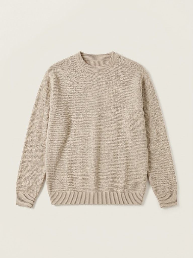 Beige Textured Knit Crewneck Sweater (Category: Longsleeves) located in Pasig City. Submitted by declutter.cay (Listing ID 1460534502, Image 2). Description: - Comfortable beige sweater - Textured knit pattern - Classic crewneck style - Long sleeves - Ribbed cuffs and hem - Versatile for layering or standalone wear - Easy to pair with jeans or trousers - Unisex (M for men, L-XL for women).