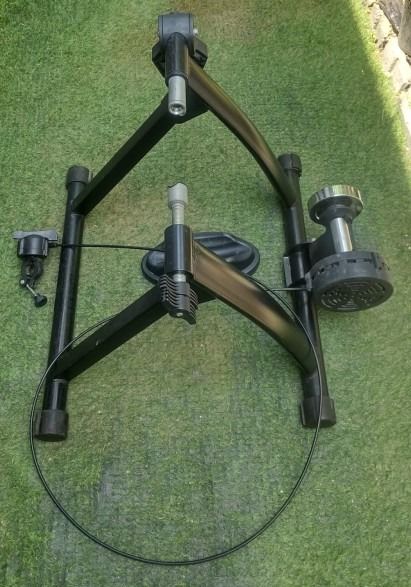 Black Bicycle Turbo Trainer Stand (Category: Bicycles) located in Calamba. Submitted by potpourri.p (Listing ID 1460554075, Image 3). Description: - Ride your bike indoors with this black turbo trainer stand. - Adjustable to fit various bike sizes. - Comes with a front wheel riser block. - Perfect for training during bad weather. - Folds for convenient storage..