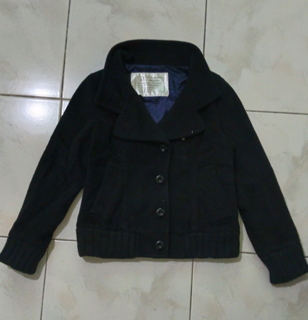 Black Button-Up Jacket with Stud Detail (Category: Coats, Jackets and Outerwear) located in Manila. Submitted by nostalgic.curated (Listing ID 1460513133, Image 1). Description: - Vintage black jacket with a collared neckline - Button-up front for easy wear - Ribbed cuffs and hem for a comfortable fit - Unique stud embellishment on one lapel for added detail - Versatile for layering, pairs well with jeans or dressier outfits.
