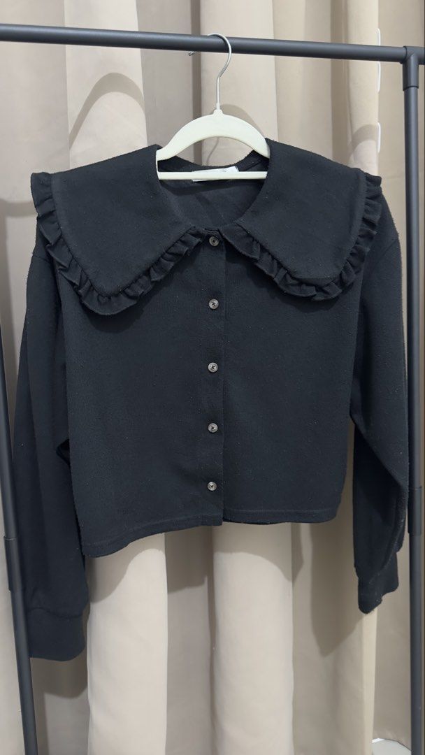 Black Cardigan with Peter Pan Collar (Category: Coats, Jackets and Outerwear) located in Taytay. Submitted by _daphnnie.21 (Listing ID 1460628234, Image 2). Description: - Cute black cropped cardigan - Features a ruffled Peter Pan collar - Button-up front - Long sleeves with elastic cuffs - Easy to style for a chic layered look.