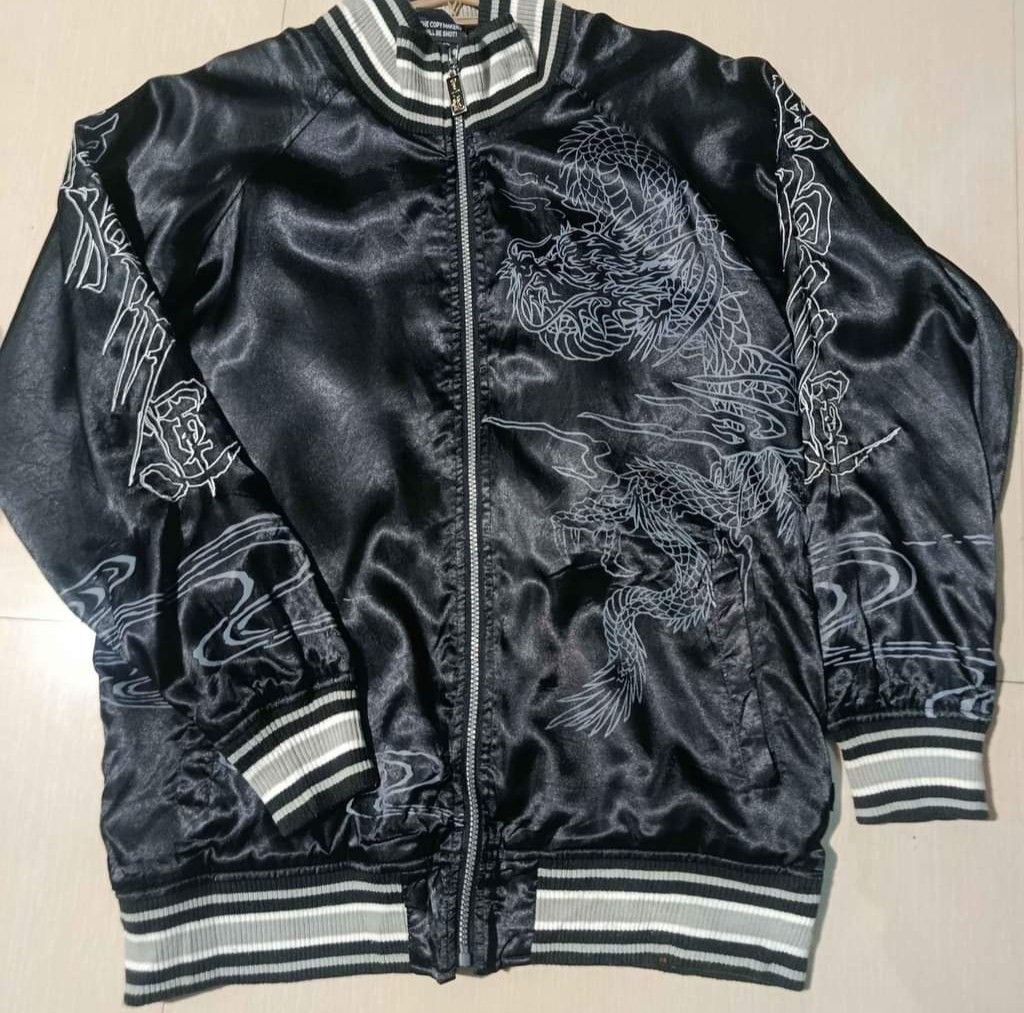Dog town Black Dragon Embroidered Bomber Jacket (Category: Coats, Jackets and Outerwear) located in Manila. Submitted by macalintal86041 (Listing ID 1460694287, Image 2). Description: - Stylish black bomber jacket - Smooth satin material - Intricate dragon embroidery - Comfortable ribbed cuffs and collar - Easy zipper closure - Estimated size: Medium to Large (M/L) - Ideal for casual outfits.