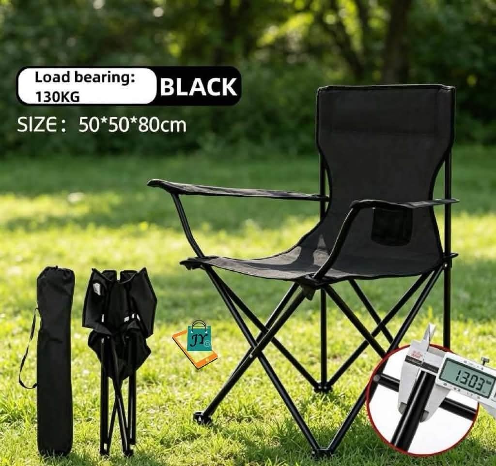 Black Folding Camping Chair with Cup Holder (Category: Chairs) located in Manila. Submitted by chaionlineshop (Listing ID 1460530563, Image 2). Description: - Sturdy black folding chair - Ideal for camping, picnics, and outdoor activities - Built-in cup holder on armrest - Load bearing capacity: up to 130KG - Dimensions: 50*50*80cm - Includes a carrying bag for easy transport - Folds compactly for convenient storage and portability.