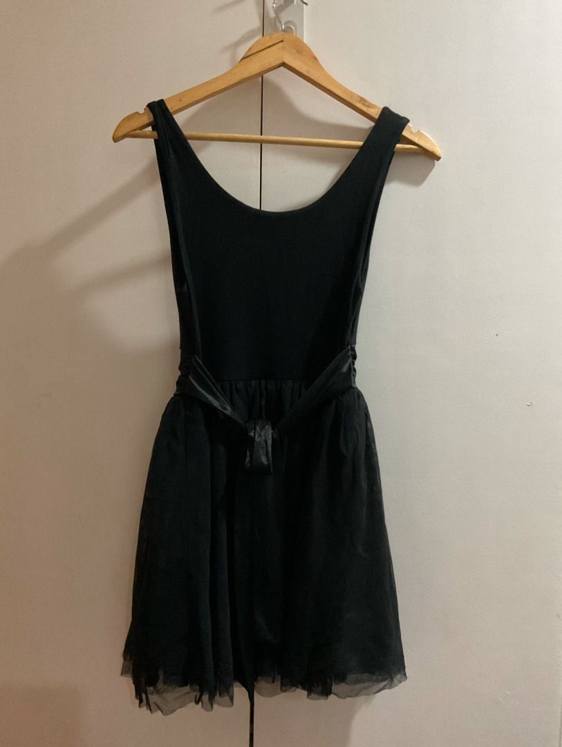 Black Formal Dress (Category: Dresses) located in Pasig City. Submitted by kachoww. (Listing ID 1460700187, Image 1). Description: Black formal dress tied at the back 💸 MoP: Maribank transfer.