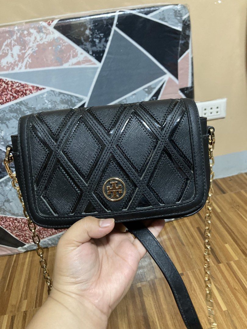 Black Gucci Marmont Shoulder Bag (Category: Luxury Bags & Wallets) located in Manila. Submitted by abengjoy30 (Listing ID 1460666443, Image 2). Description: Classic black Gucci Marmont bag. Quilted leather with gold GG hardware. Chain strap. Great for day or night. A timeless piece for any wardrobe..