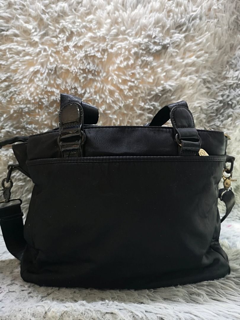 Black Hand & Sling Bag (Category: Shoulder Bags) located in Santa Cruz. Submitted by jmy_surplus.2 (Listing ID 1460524539, Image 2). Description: Size ; L - 10 W - 15.4 Color ; Black Type ; Hand & Sling bag Brand ; No brand Material ; Nylon Style ; Black Zipper Closure Hand & Sling Bag LR 173 JMY 5 Batch #218.