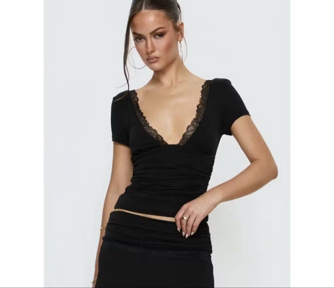 Black Lace Trim Ruched V-Neck Top (Category: Blouses) located in Quezon City. Submitted by lovedbymari (Listing ID 1460594372, Image 1). Description: Deep V-neckline with lace trim, worn once only Can fit S-M .