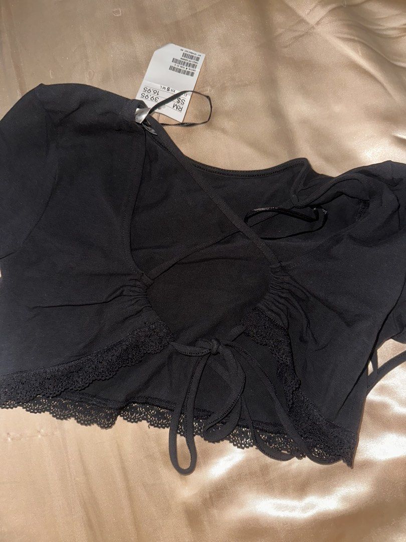 Black Lace Trim Tie Back Crop Top (Category: Others Tops) located in Manila. Submitted by _declutterwithmai (Listing ID 1460545397, Image 2). Description: - Cute black crop top - Lace trim detail - Tie back closure - Short sleeves - Size: S/M - Original Price: RM 39.95 - Selling Price: RM 16.95.