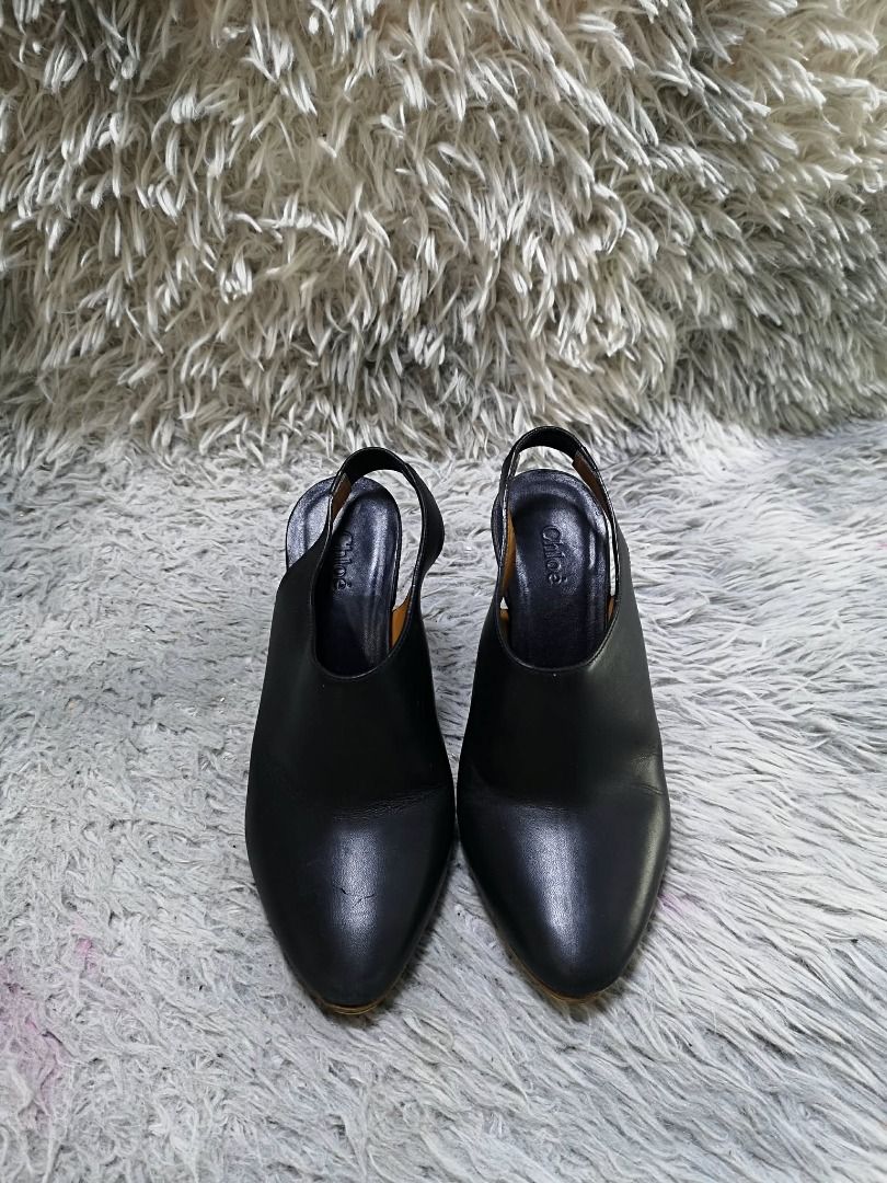 Black leather Wedge Slingback Booties (Category: Heels) located in Santa Cruz. Submitted by jmy_surplus.2 (Listing ID 1460574785, Image 1). Description: Size ; 22.5cm Color ; Black Type ; Boots Brand ; No brand Material ; Leather Style ; Black leather Wedge Boots LR 172 JMY 1 Batch #219.