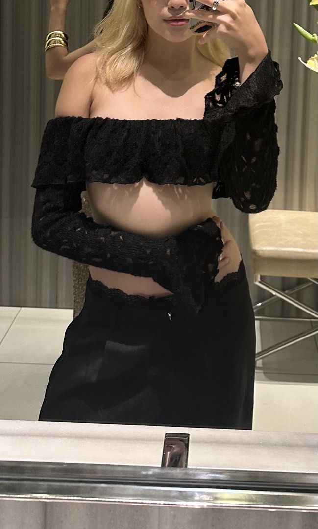 Black Off-Shoulder Lace Crop Top (Category: Sets or Coordinates) located in Manila. Submitted by juenwears (Listing ID 1460707060, Image 3). Description: - Black off-shoulder crop top - Long lace sleeves - High-waisted wide-leg pants - Lace trim detail at the waist - Very chic and stylish outfit - Ideal for night outs or special occasions - Flattering fit, looks amazing.
