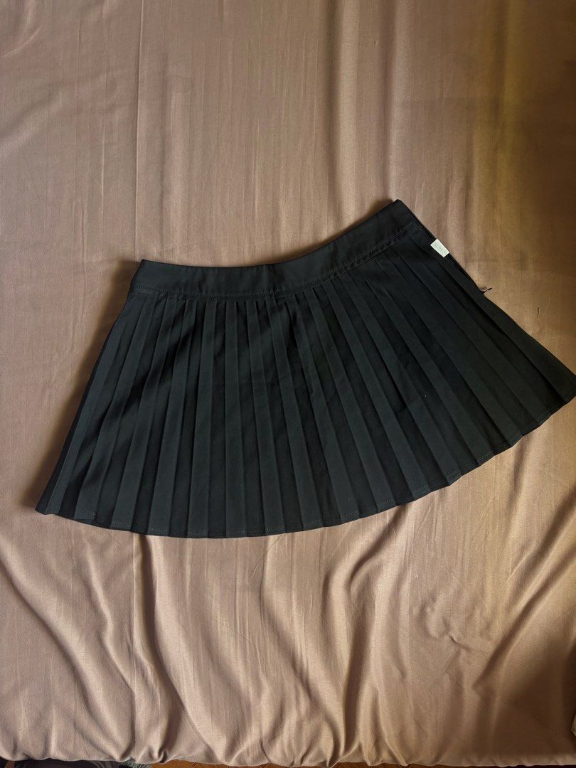 Black pleated mini skirt (Category: Skirts) located in Marikina City. Submitted by momdeclutterz (Listing ID 1460552926, Image 1). Description: Brand: Zara Size: L Never worn Good quality 📍Marikina City Payment before shipping. MOP: Maribank or BPI .