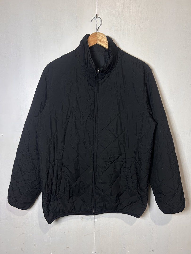 Black Quilted Zip-Up Jacket (Category: Coats, Jackets and Outerwear) located in Tuguegarao City. Submitted by thrift_ni_boy (Listing ID 1460535870, Image 1). Description: - Black quilted jacket - Size L - Zip-up front closure - Stand-up collar - Two zippered side pockets - Ideal for layering or as light outerwear.
