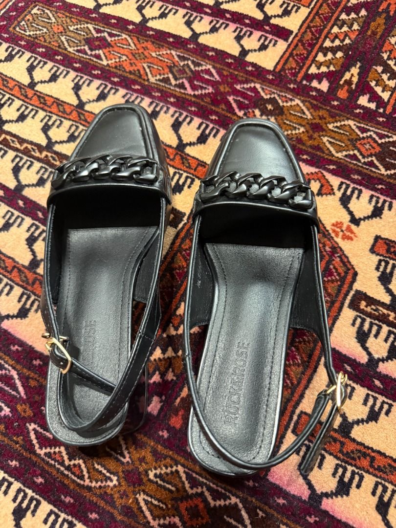 ROCK & ROSE Black Chain Slingback Loafer Heels (37 / Orig ₱1,499) (Category: Loafers) located in Makati City. Submitted by fpled (Listing ID 1460680718, Image 1). Description: ✨ ROCK & ROSE "ROLLY" BLACK CHAIN SLINGBACK LOAFER HEELS ✨ • Size US 6.5–7 • Landmark Original Tag Included (Retail: ₱1,499) Rock & Rose slingback loafer heels!--Designed with a modern structured square toe, a sturdy low block heel (~1.5) for all-day walking comfort, and an