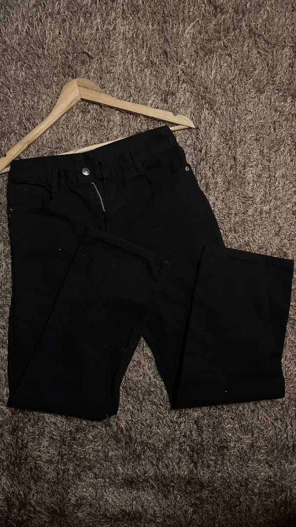 Black Straight-Leg Pants (Category: Jeans) located in Tagum. Submitted by _prelovedbyzl (Listing ID 1460647482, Image 1). Description: Preloved black pants in good condition. Classic and versatile style, perfect for casual or semi-formal outfits. Features a zip and button closure with front and back pockets. Color: Black Condition: Preloved / good condition Size: 28.