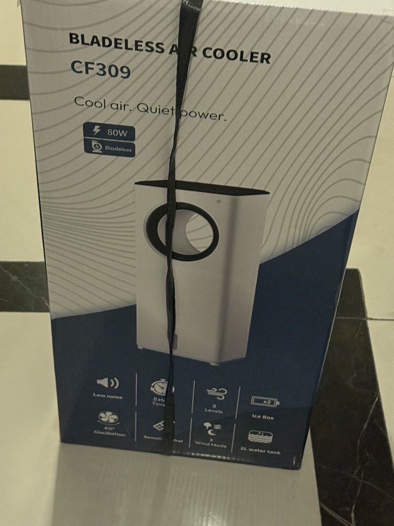 Bladeless Air Cooler CF309 - Cool & Quiet Power (Category: Air Conditioning and Heating) located in Pasay City. Submitted by shairabear123 (Listing ID 1460598883, Image 1). Description: - Bladeless Air Cooler CF309 - Quiet and Powerful Cooling - 8-Hour Timer - 3 Speed Levels - 40° Oscillation - Includes Remote Control - Comes with Ice Box - 2L Water Tank Capacity - Wind Mode Feature - Keeps your space cool and comfortable.